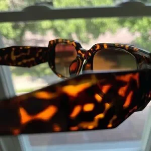 Prada | Accessories | Elegant Prada Sunglasses With A Chic 